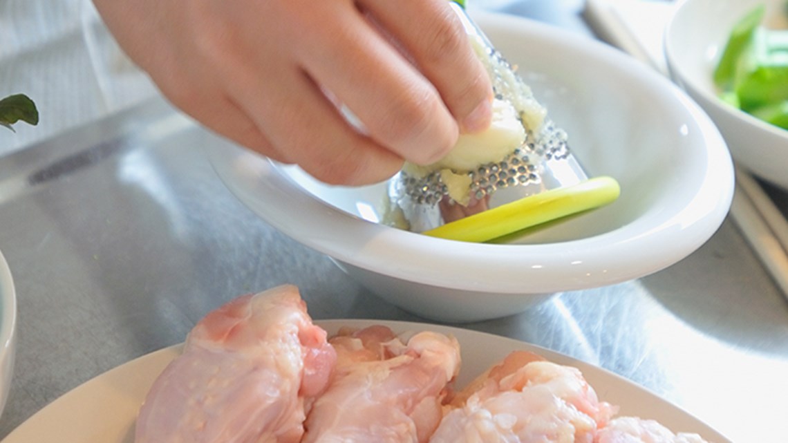 Hands preparing food